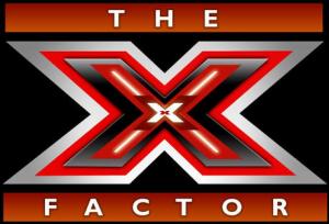 X Factor's Kitty Brucknell hails liposuction